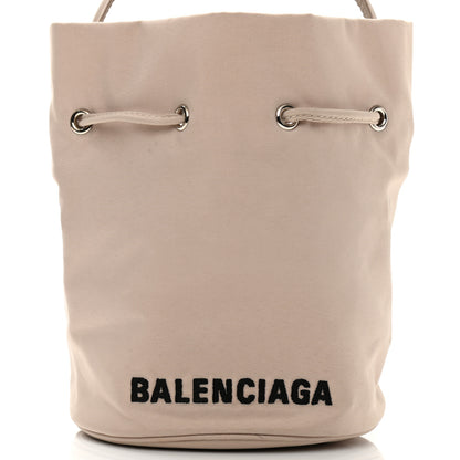 Balenciaga Recycled Sport Nylon Logo Embroidered Wheel Drawstring Bucket Bag Cream Black 7 of 9