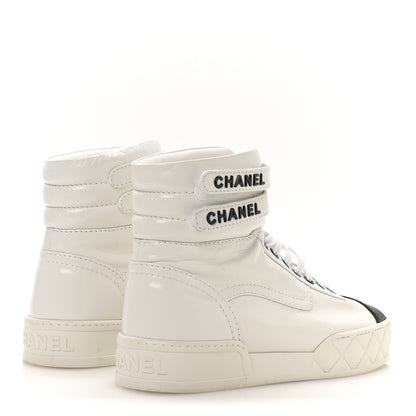 Chanel Shiny Calfskin Logo High Top Sneakers 38.5 White 5 of 9