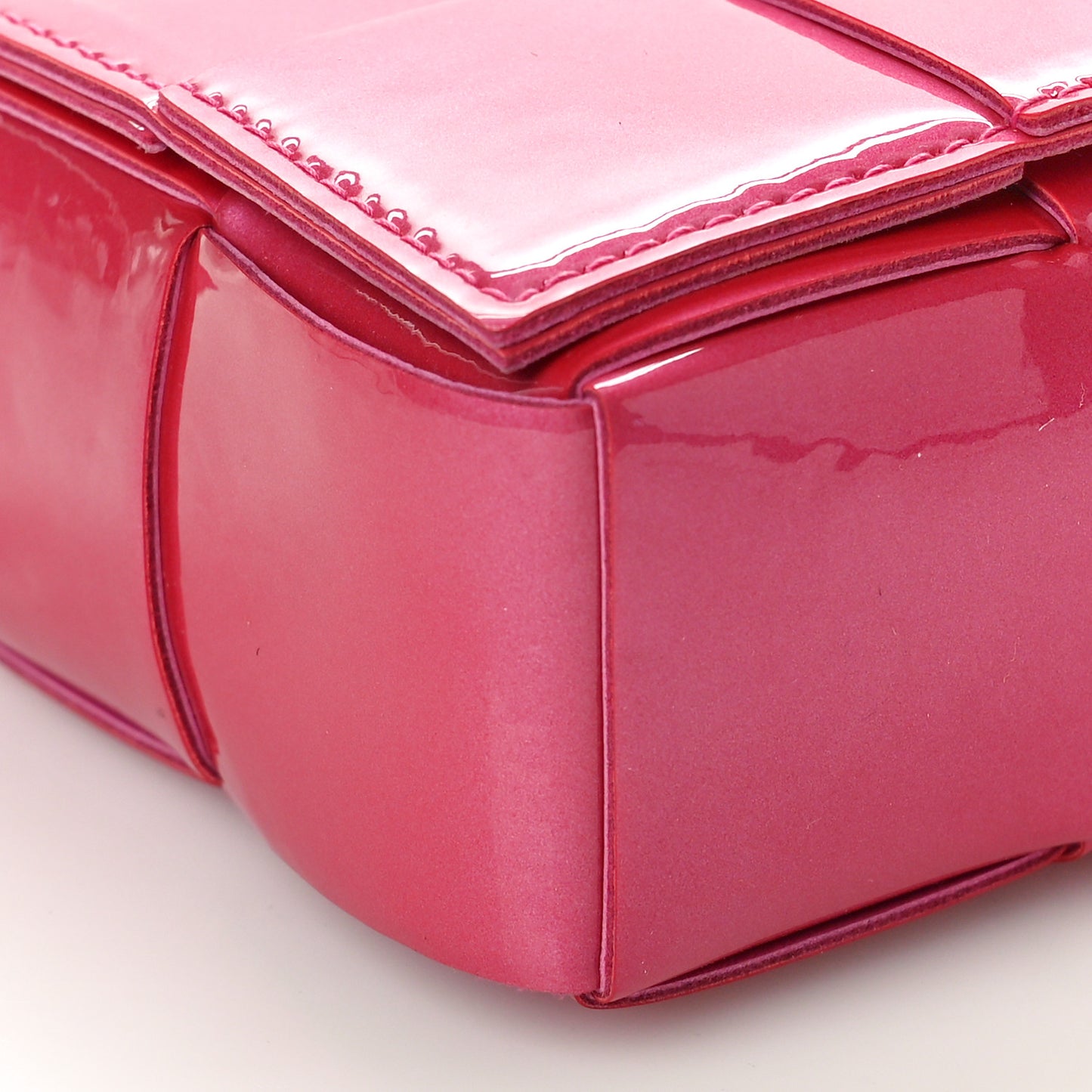 Metallic Patent Calfskin Maxi Intrecciato Extra Mini Cassette Crossbody Bag Pink