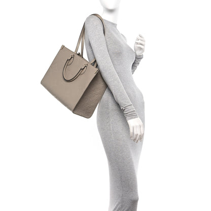 Louis Vuitton Empreinte Monogram Giant Onthego MM Tourterelle 2 of 10