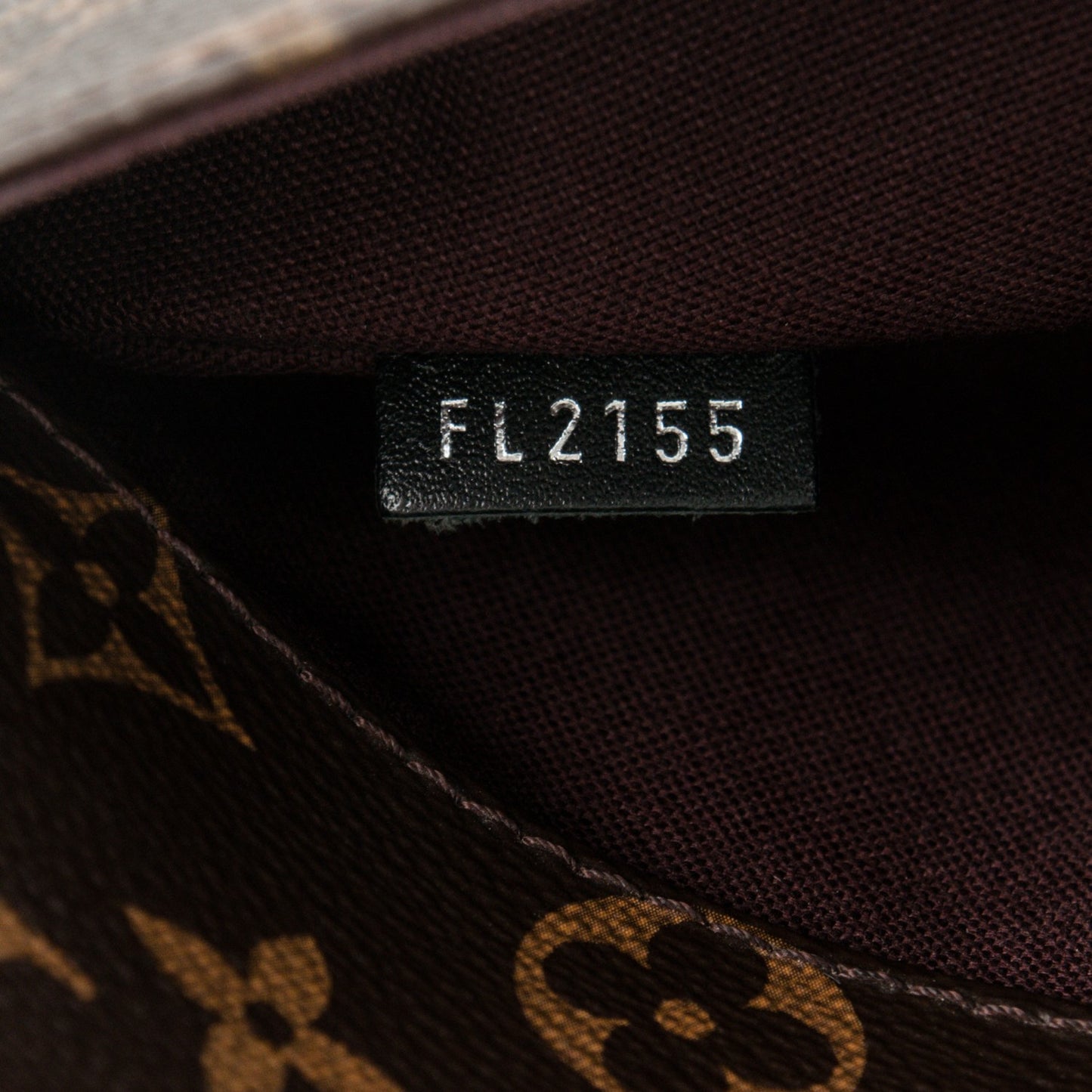 Monogram Macassar District MM