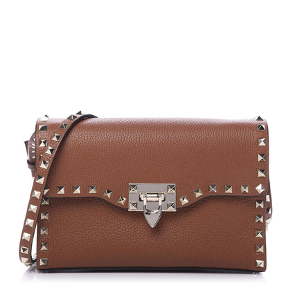 Valentino Garavani Pebbled Calfskin Medium Rockstud Flip Lock Crossbody Bag Saddle Brown 1 of 9