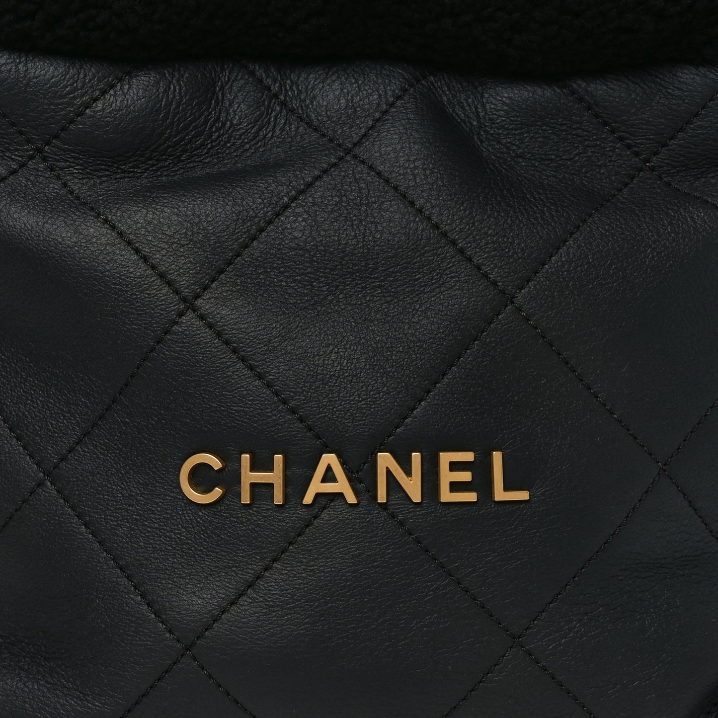 Aged Lambskin Shearling Quilted Small Chanel 22 Black