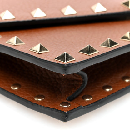 Valentino Garavani Pebbled Calfskin Rockstud Envelope Wallet on Chain Bright Cognac 8 of 9