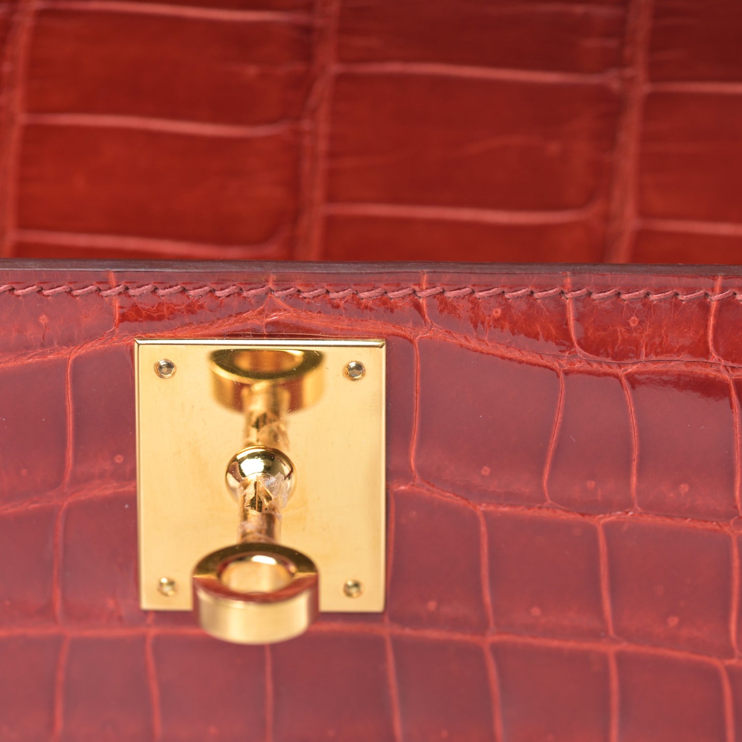 Shiny Porosus Crocodile Kelly Cut Pochette Sanguine