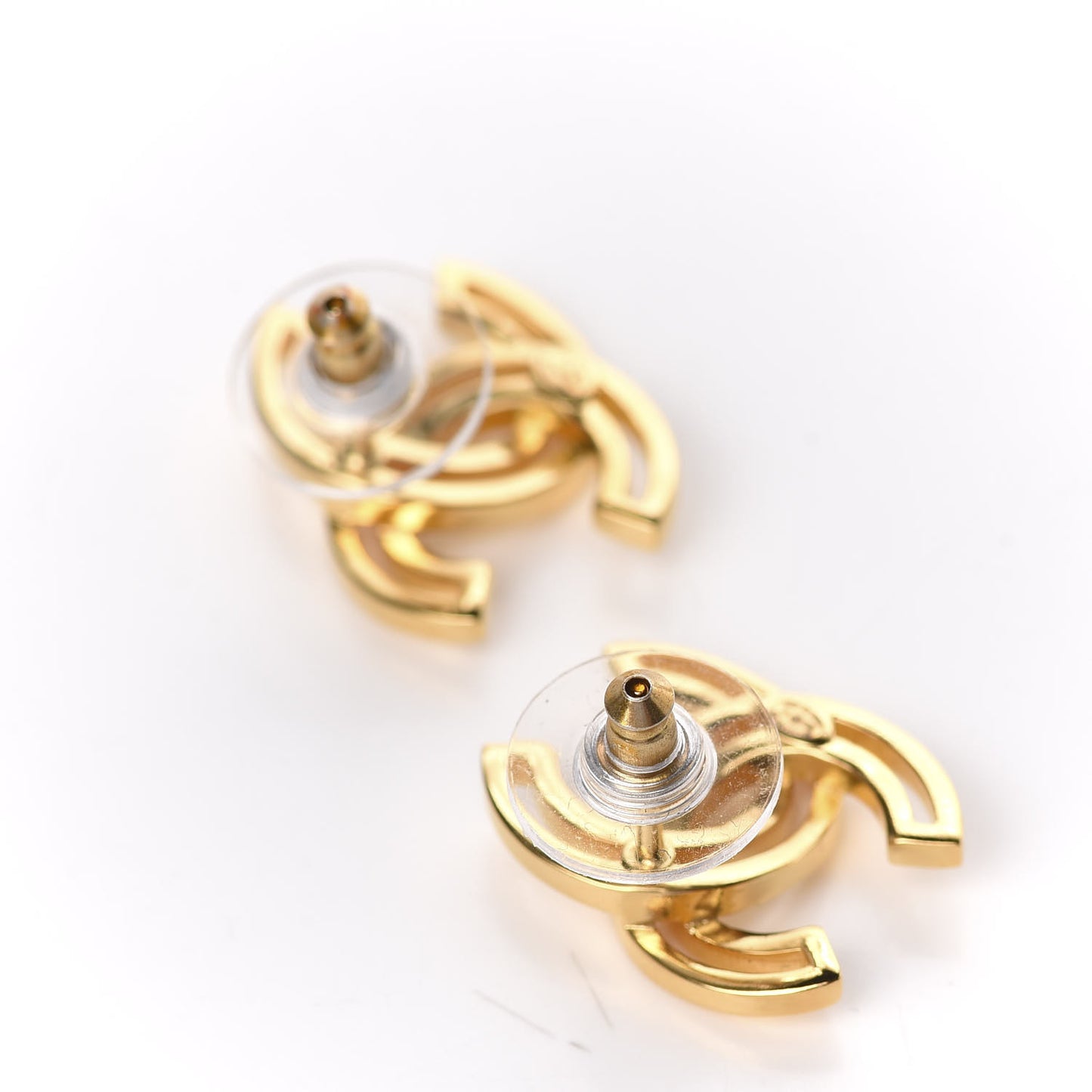 Metal Obazine CC Earrings Gold
