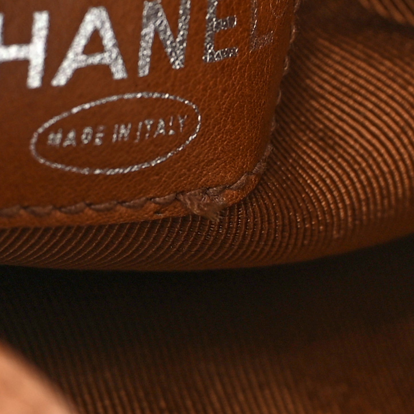 Lambskin CC Stitched Drawstring Bucket Backpack Tan