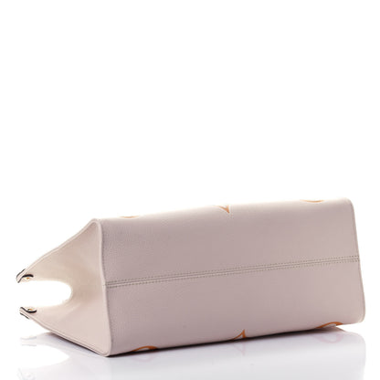 Louis Vuitton Empreinte Monogram Giant By The Pool Onthego MM Cream Saffron 3 of 4