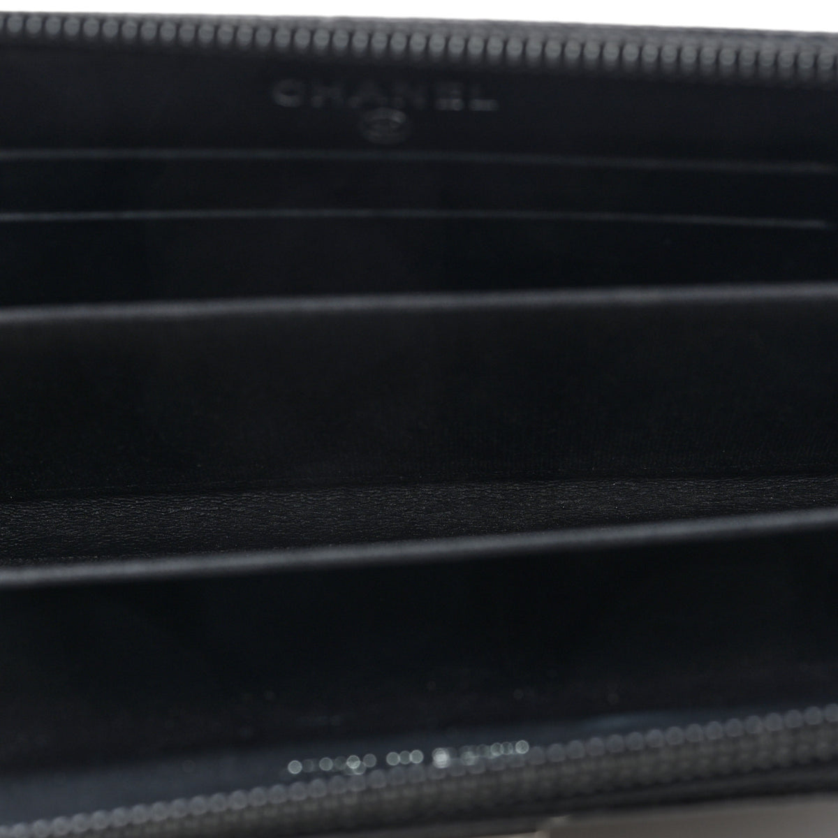 Caviar Quilted Small Boy Zip Around Wallet Black