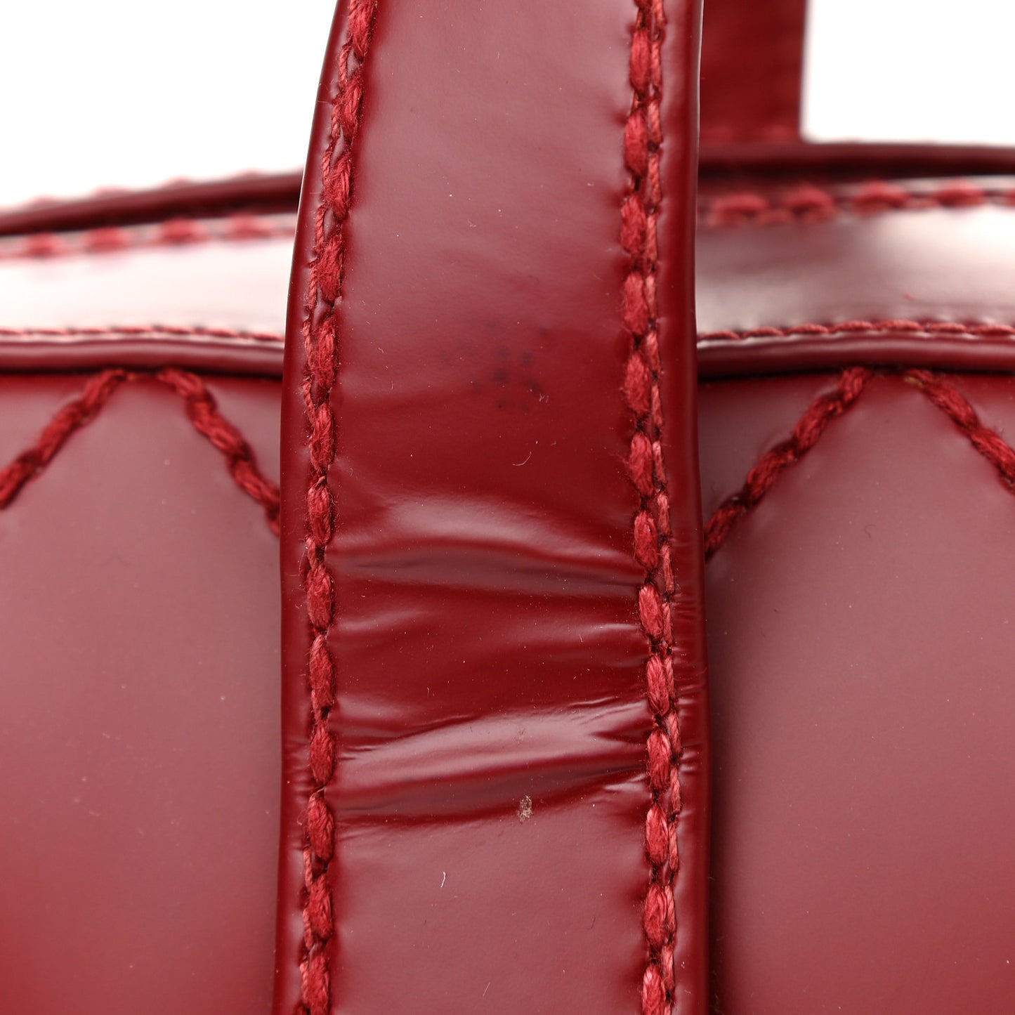 Calfskin Stitch Surpique Bowler Red