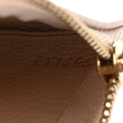 Louis Vuitton Empreinte Monogram Giant Key Pouch Dream Beige 7 of 8