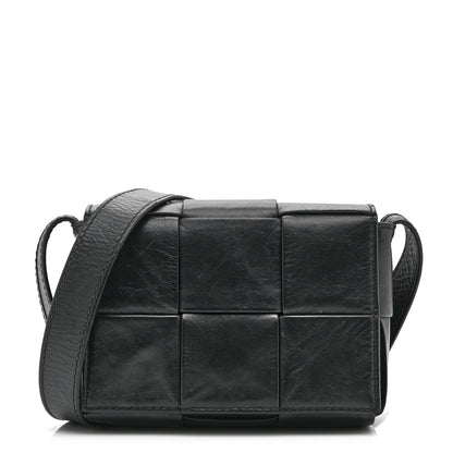 Bottega Veneta Crinkled Lambskin Maxi Intrecciato Extra Mini Cassette Crossbody Bag Black 1 of 9