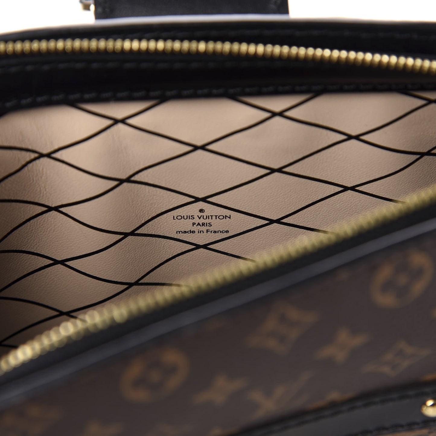 Reverse Monogram Trunk Clutch