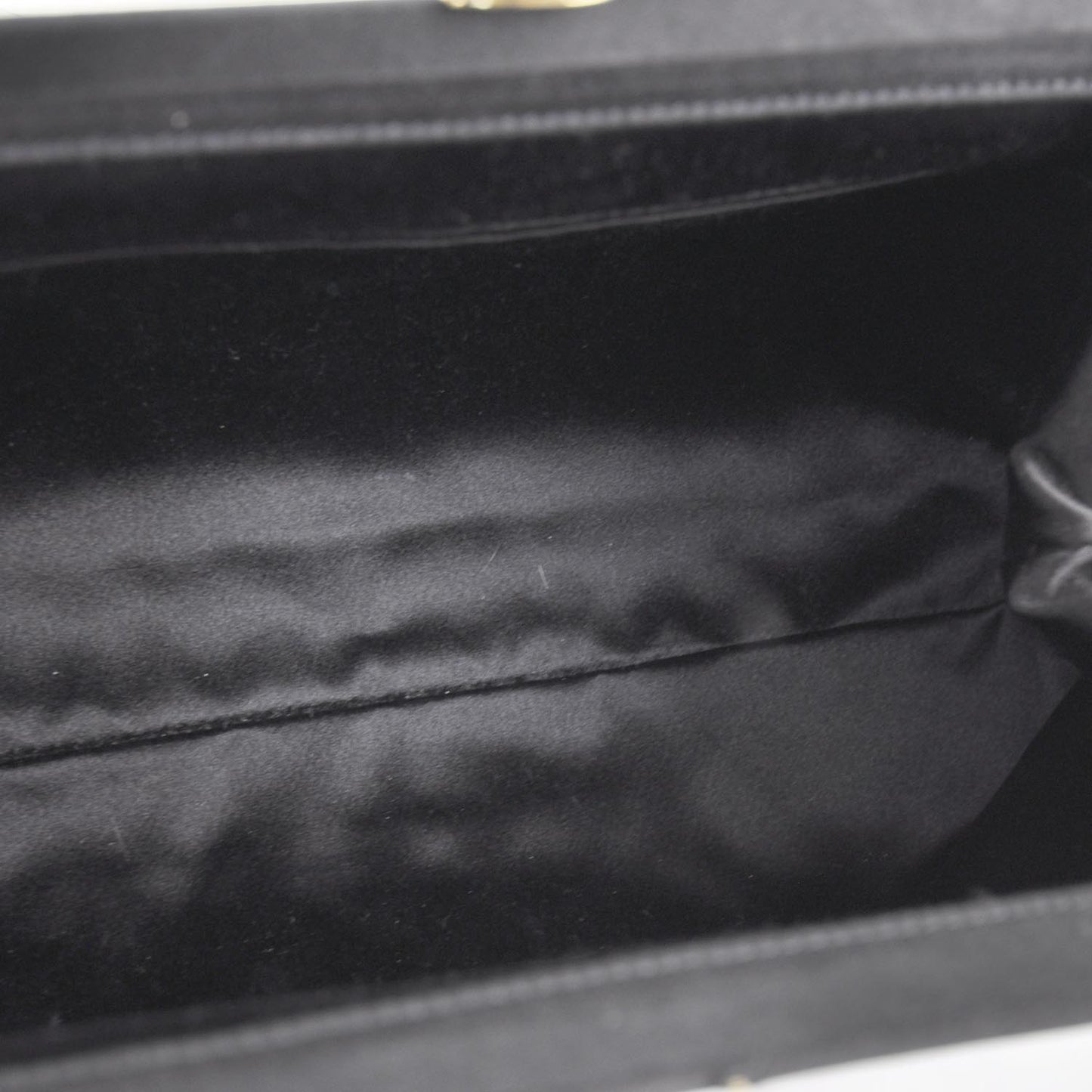 Satin Leather Laser Cut Floral Frame Bag