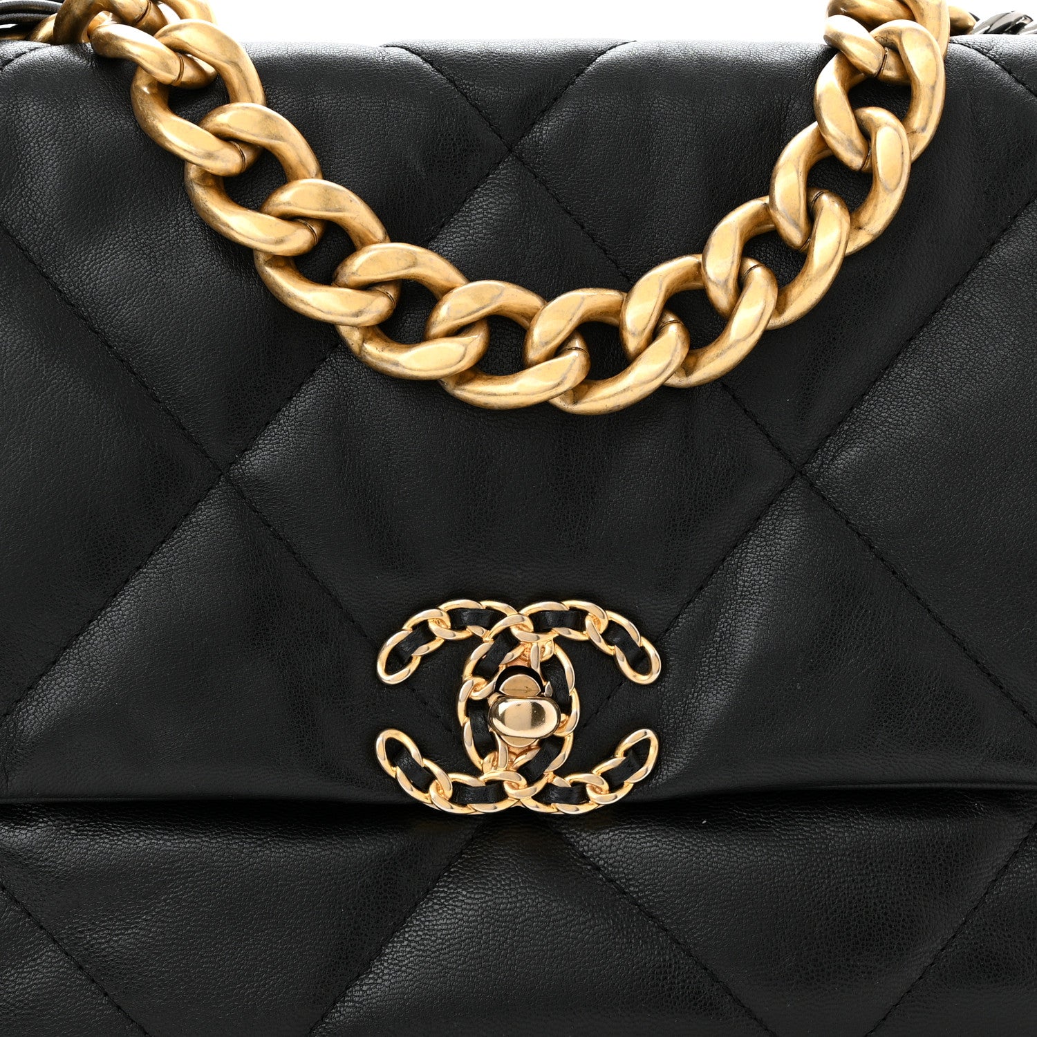 close up image of chanel goatskin in black by FASHIONPHILE