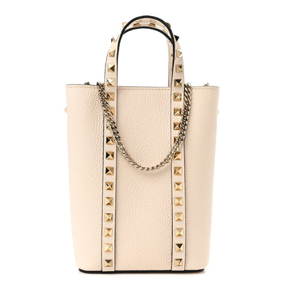 Valentino Garavani Pebbled Calfskin Rockstud North South Crossbody Bag Light Ivory 1 of 9