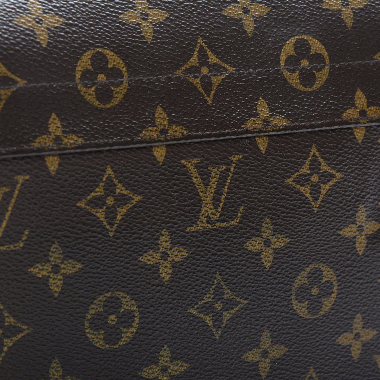 Monogram Macassar District PM