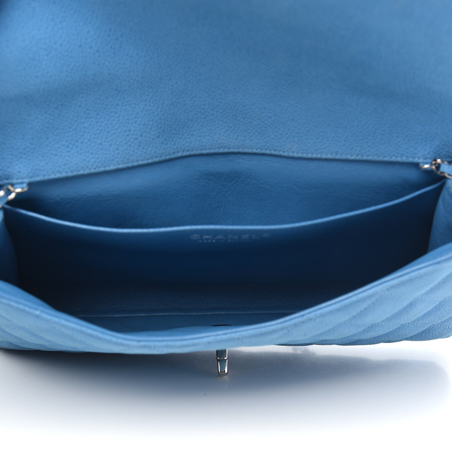 Iridescent Caviar Quilted Clutch With Chain Flap Blue