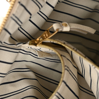 Louis Vuitton Empreinte Lumineuse PM Neige 13 of 25