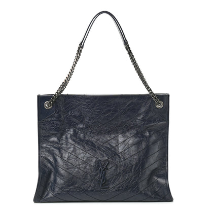 Saint Laurent Crinkled Calfskin Matelasse Monogram Niki Shoulder Bag Deep Marine 1 of 10