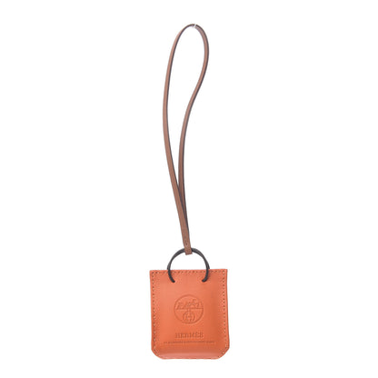 Hermes Milo Lambskin Swift Shopping Bag Charm Feu Gold 1 of 2