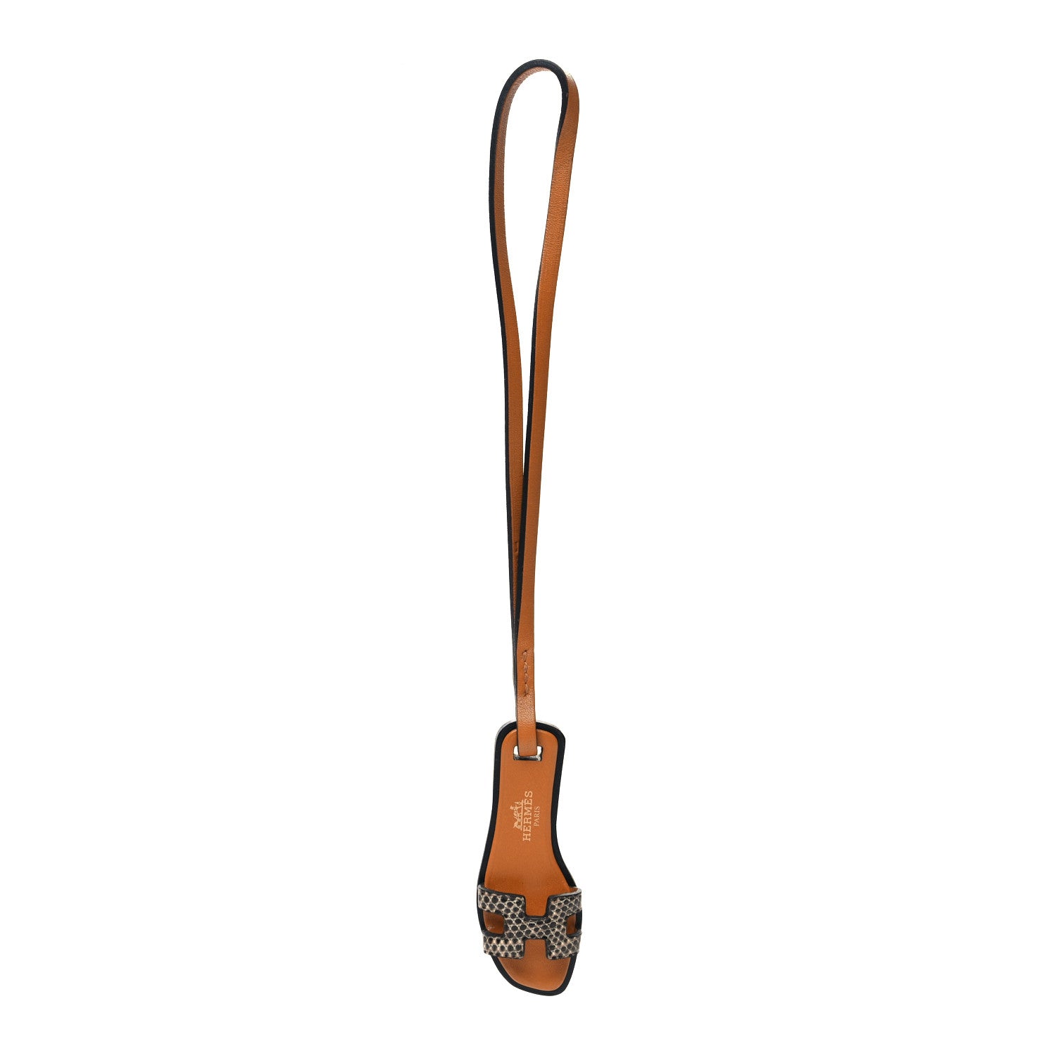 this is an image of an HERMES Lizard Butler Calfskin Hunter Oran Nano Bag Charm in the colors Naturel Sable Black by fashionphile
