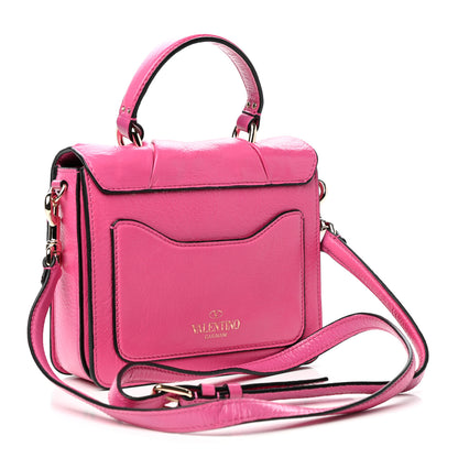 Valentino Garavani Pebbled Calfskin Rockstud Bow Top Handle Bag Pink Orchid 3 of 9
