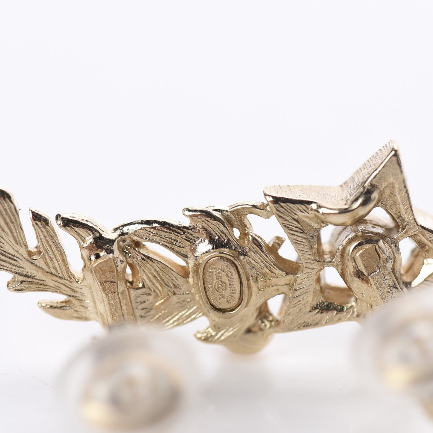 Feather Star CC Clip On Earrings Gold