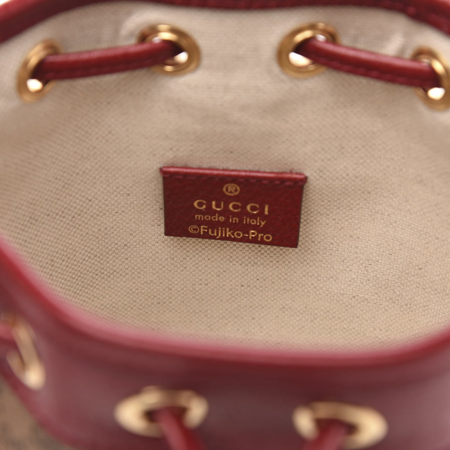 X DORAEMON Mini Vintage GG Supreme Monogram Textured Dollar Calfskin Mini Bucket Bag Beige Ebony Multicolor New Cherry Red