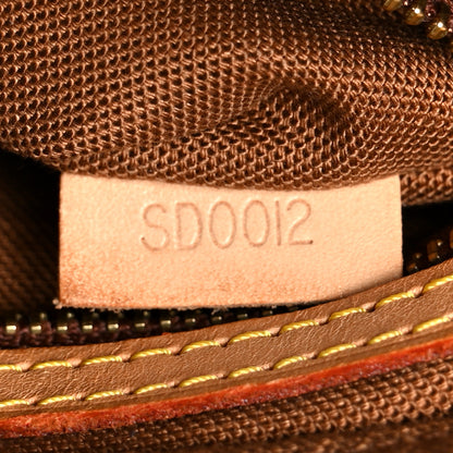 Louis Vuitton Monogram Trotteur 7 of 10