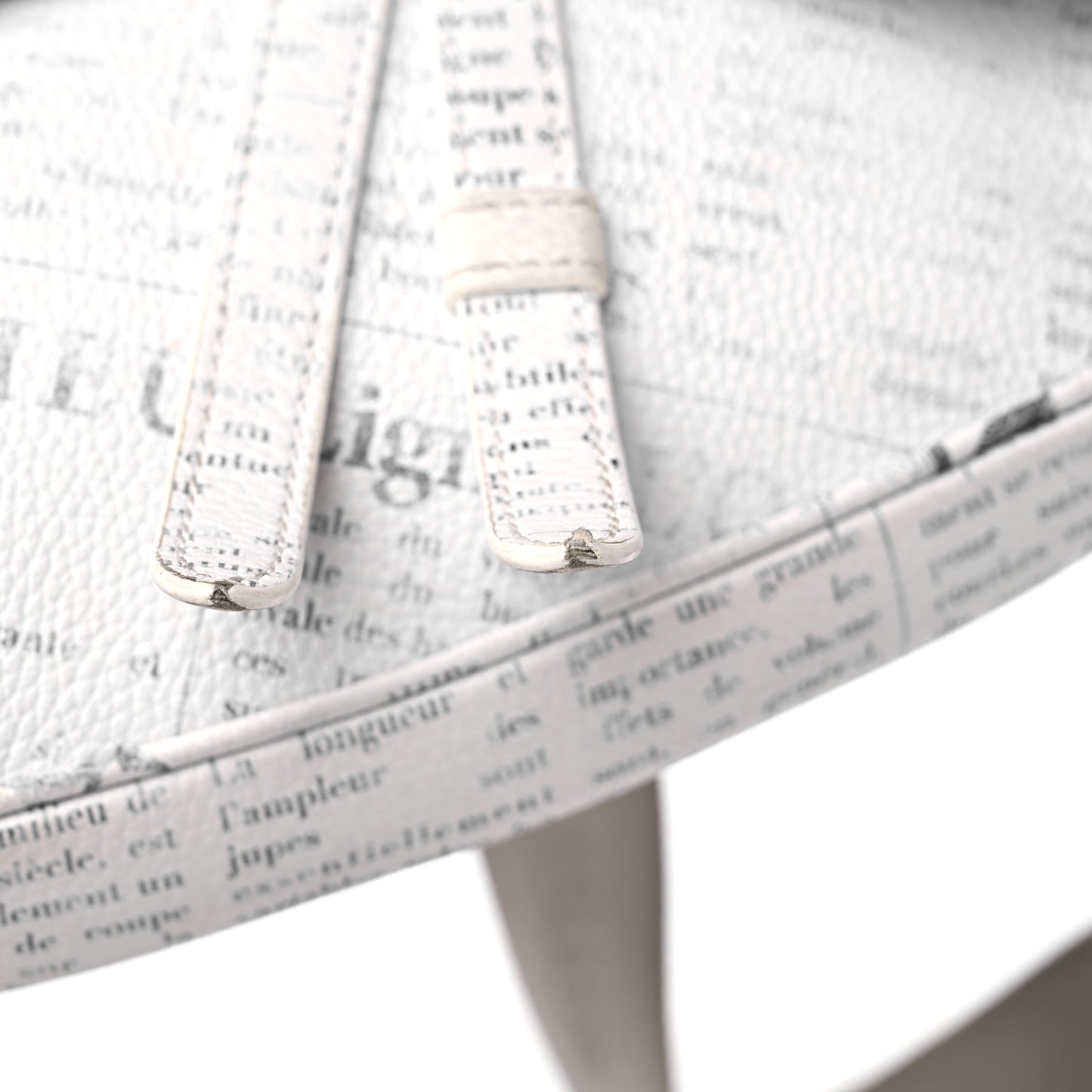 X DANIEL ARSHAM Grained Calfskin Newspaper Print Saddle Bag White