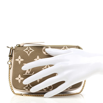 Louis Vuitton Empreinte Spring in the City Mini Pochette Accessories Kaki Beige Cream 2 of 7