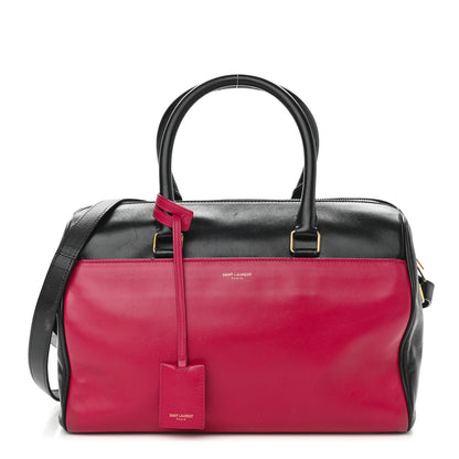 Saint Laurent Smooth Calfskin Bi-Color Duffle 6 Fuchsia Black 1 of 16