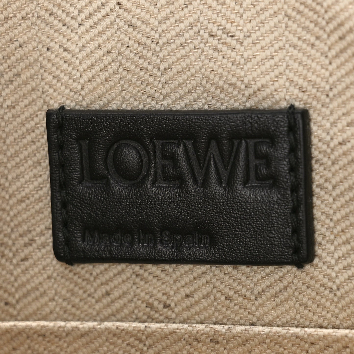 Calfskin Linen Embossed Large T Pouch Black