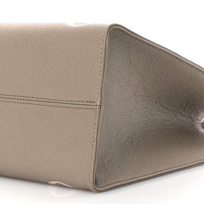 Louis Vuitton Empreinte Monogram Giant Onthego MM Tourterelle Creme 10 of 13