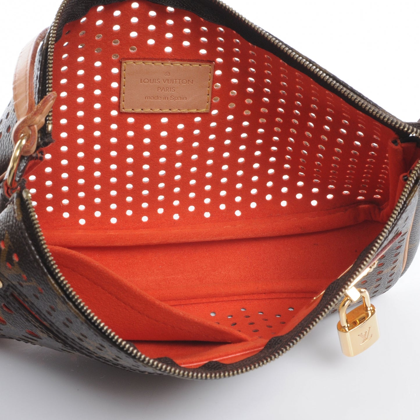 Monogram Perforated Pochette Accessories Bag Orange