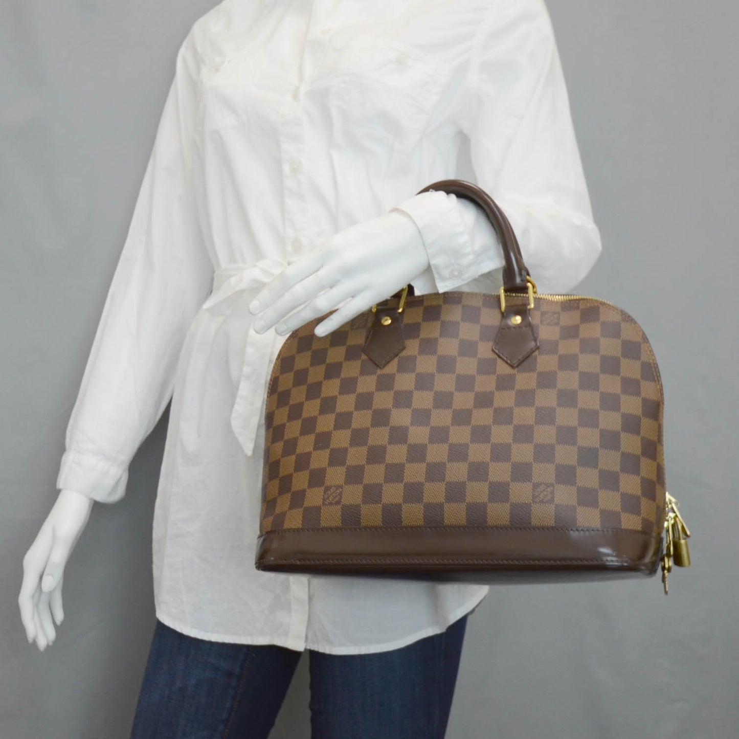 Damier Ebene Alma PM