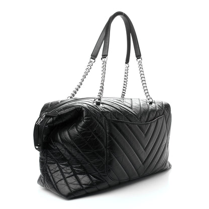 Chanel Aged Calfskin Chevron Quilted Duffle Bag Black 2 of 9