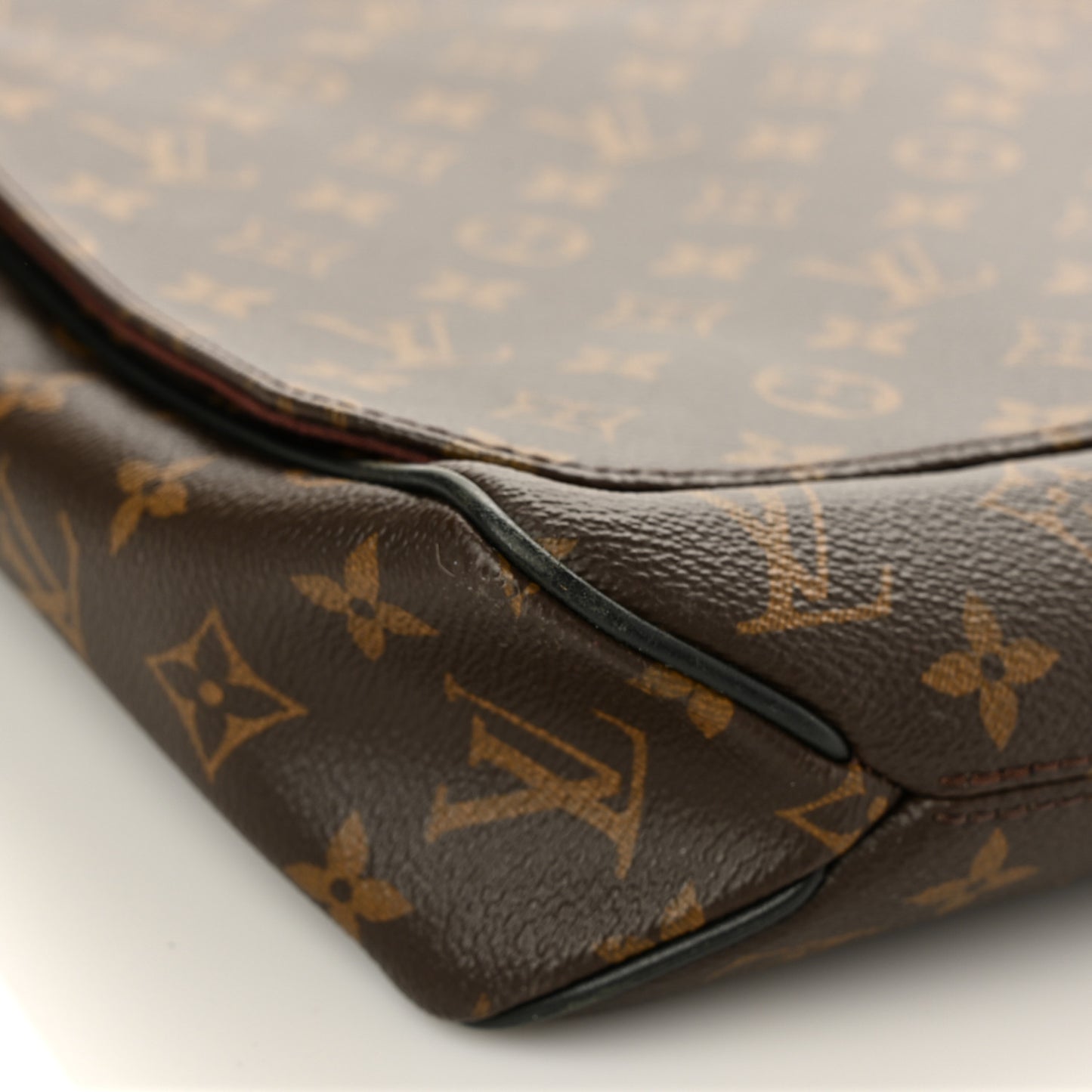 Monogram Macassar District MM