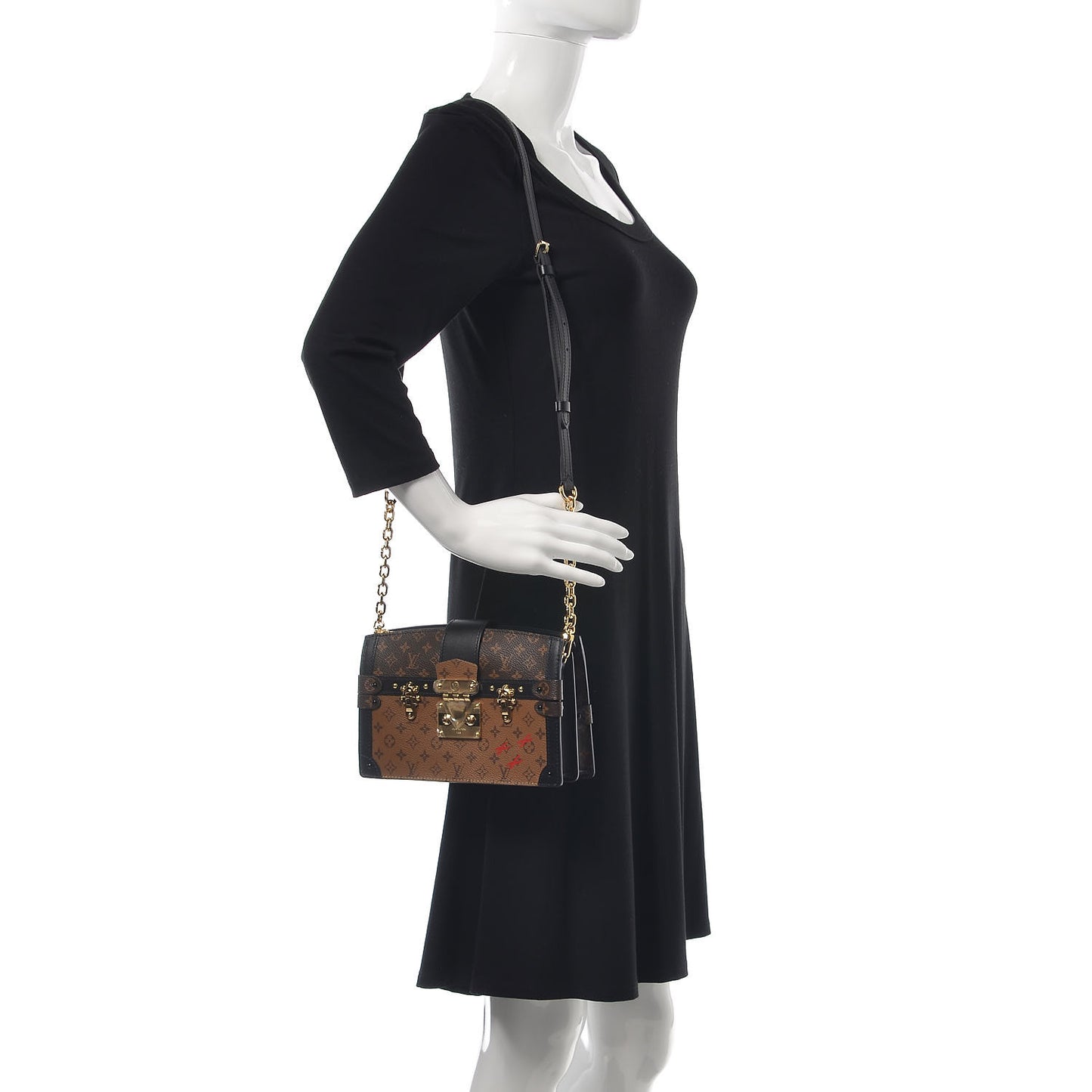 Reverse Monogram Trunk Clutch
