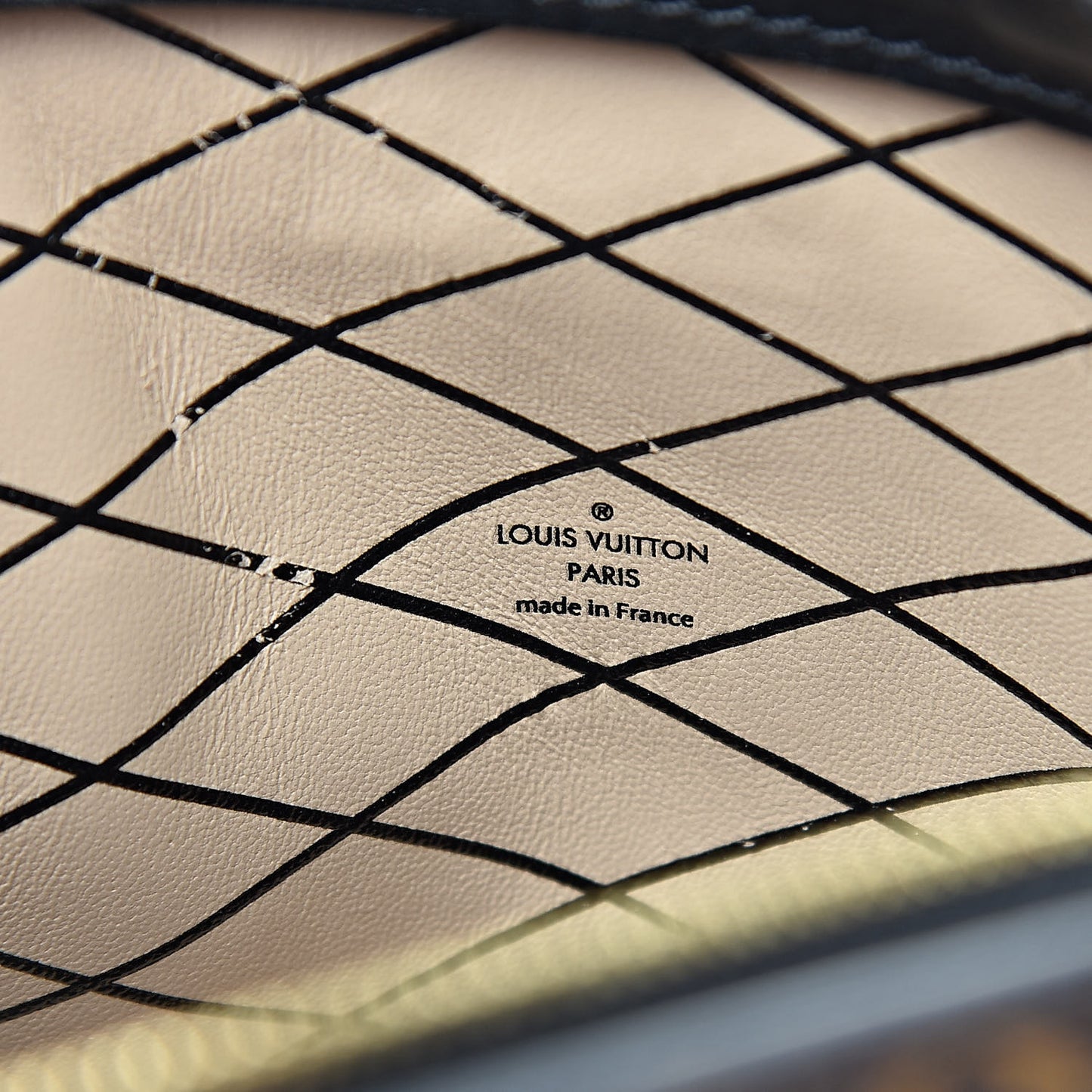 Reverse Monogram Trunk Clutch