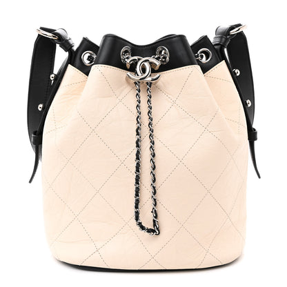 Chanel Aged Calfskin Quilted CC Chain Bucket Drawstring Bag Ivory Black 1 of 10