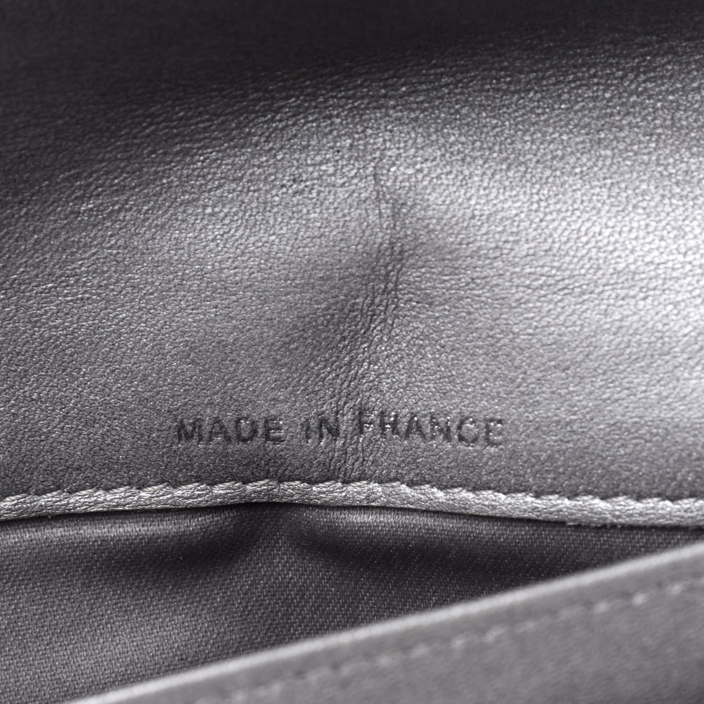 Lambskin Camellia Embossed Yen Wallet Black