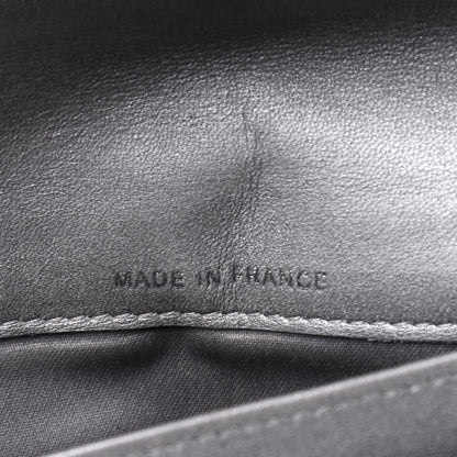 Chanel Lambskin Camellia Embossed Yen Wallet Black 7 of 26