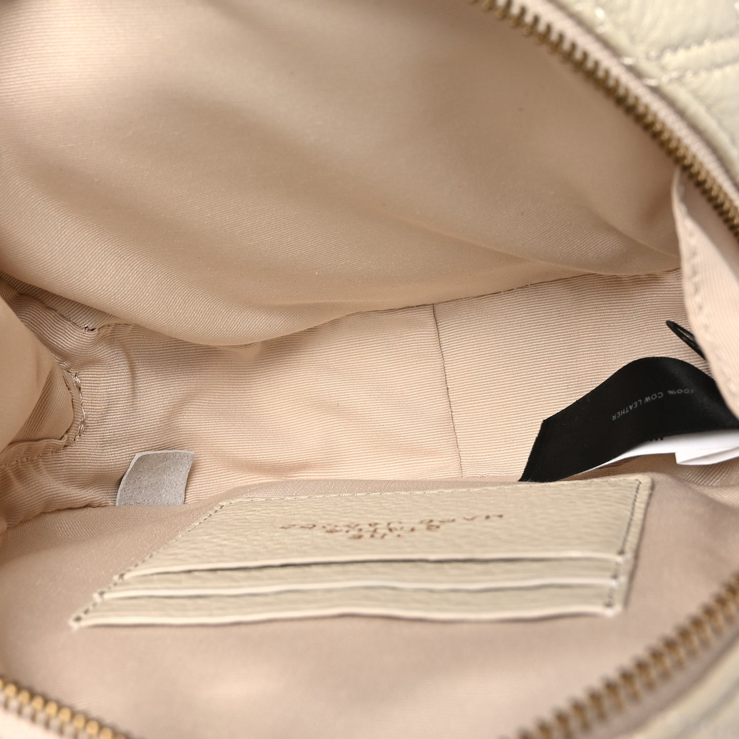 Grained Calfskin Quilted The Status Round Crossbody Oatmilk