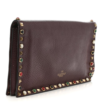 Valentino Garavani Pebbled Calfskin Rockstud Rolling Wristlet Clutch  Rubin 3 of 13