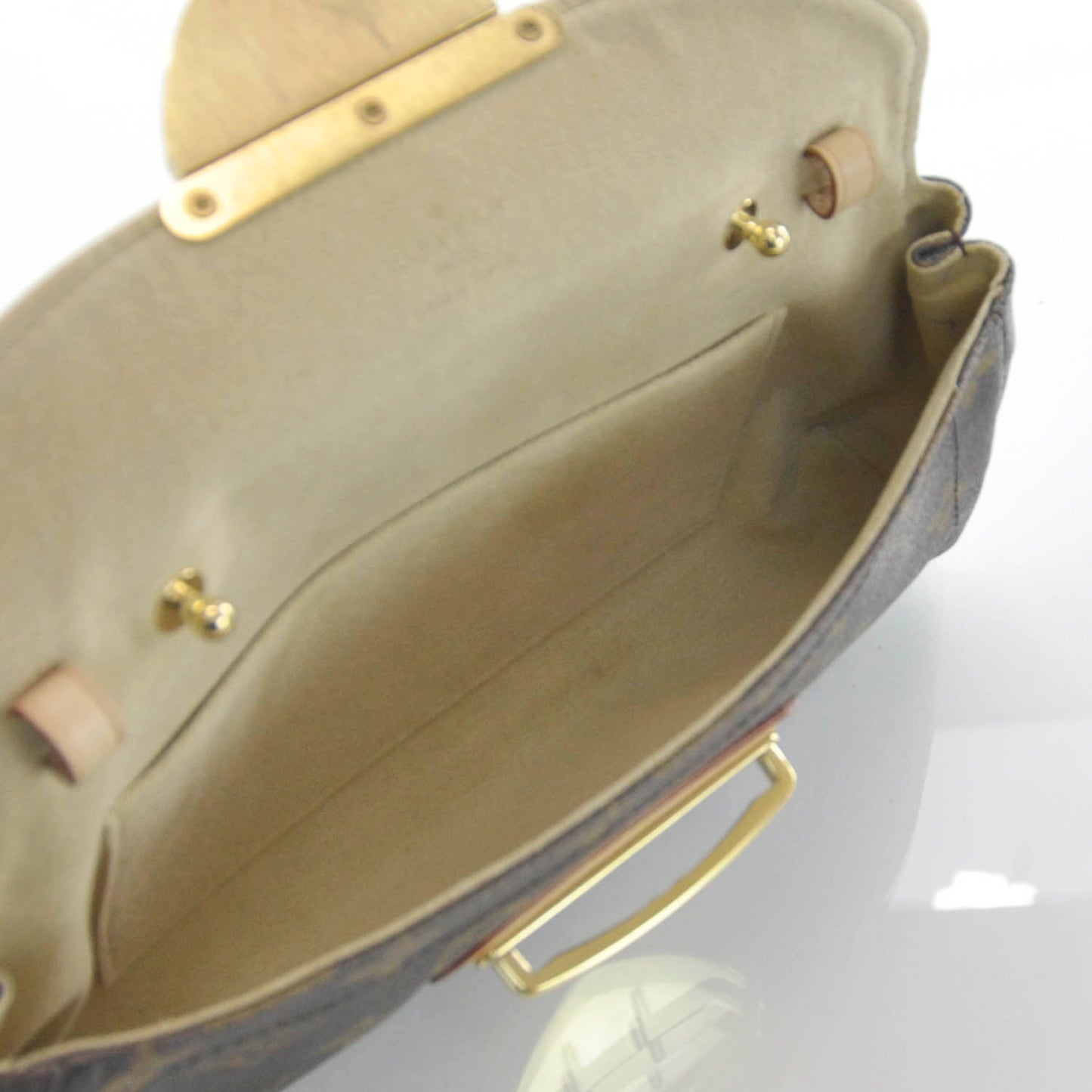 Monogram Beverly Clutch