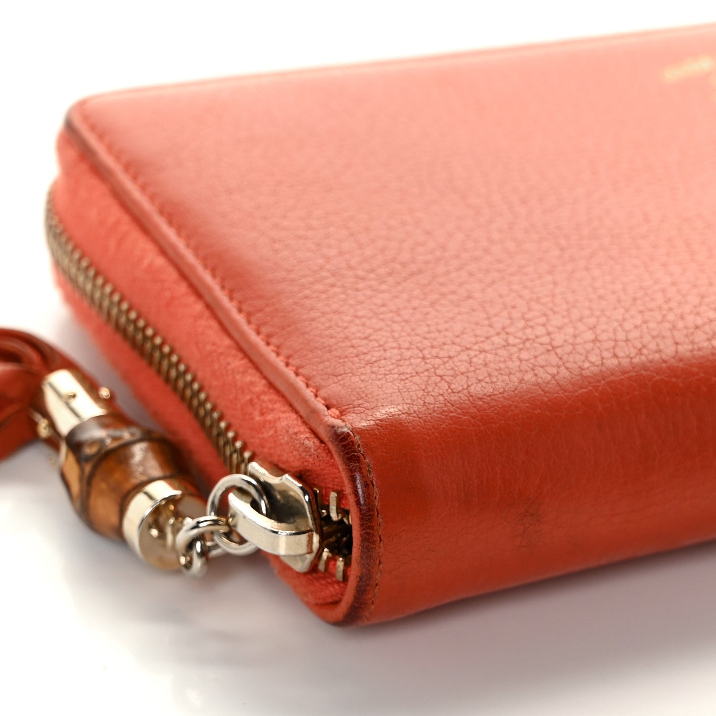Pebbled Calfskin Bamboo Tassel Zip Around Wallet Orange
