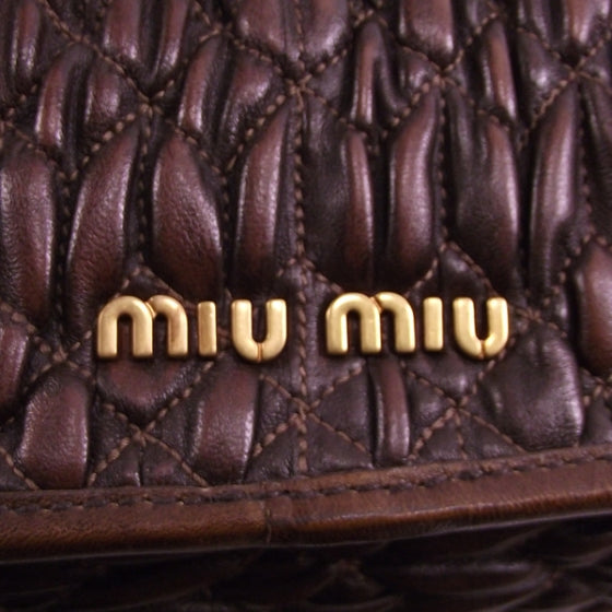 Leather Matelasse Turn Lock Flap