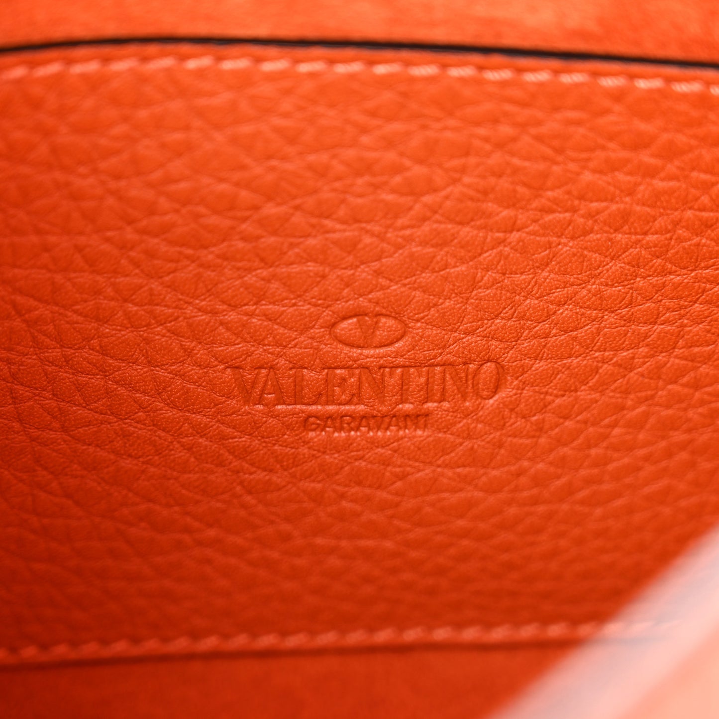 Pebbled Calfskin Medium Rockstud Flip Lock Crossbody Bag Orange